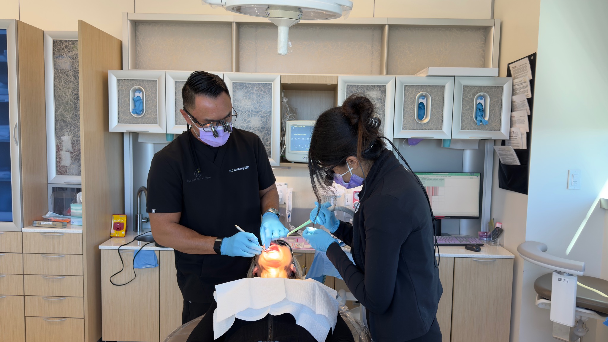 Dr. R.J. and his team providing dental care